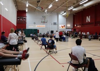 Students wait to get their EKG done