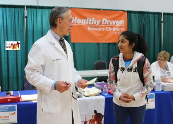 Dr. Marek talks with Junior Board student